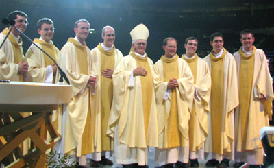 The eight new priests with their Bishop