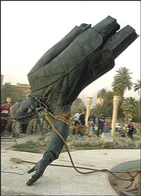 Saddam statue falling