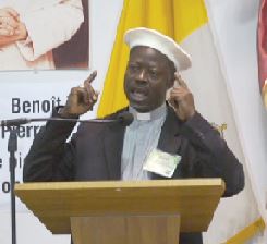 Bishop Madega speaking