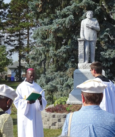 Bishop Mathieu Madega blesses Louis Even’s monument