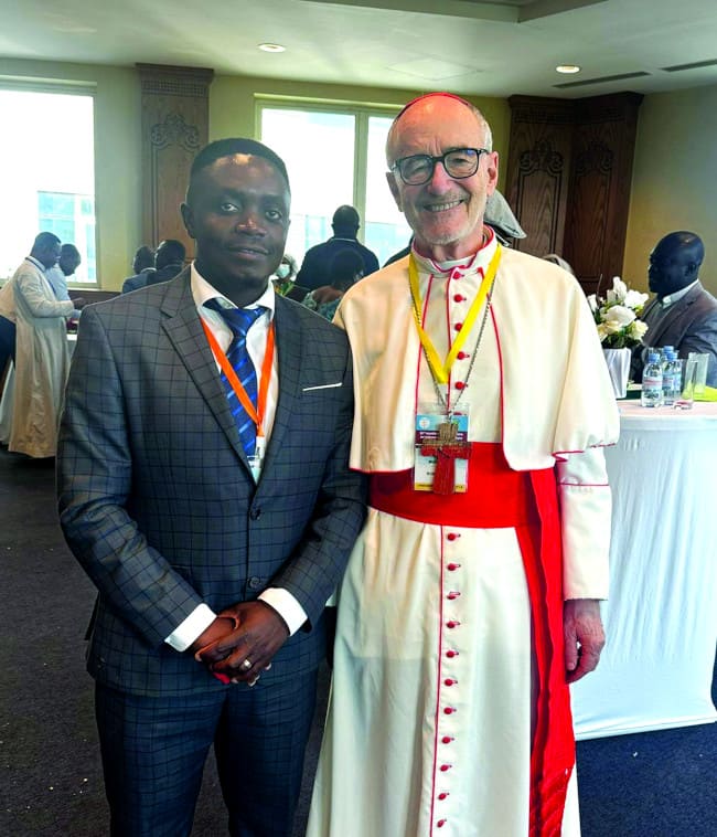 Mr. Philbert Bagilimana with Cardinal Czerny